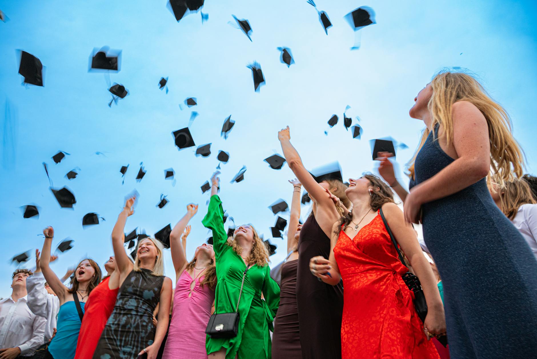 Group of diverse graduates outdoors (Incomplete: max_output_tokens)